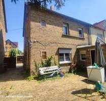 Haus zum Kaufen in Bitterfeld-Wolfen OT Holzweißig 109.000,00 € 116.9 m²