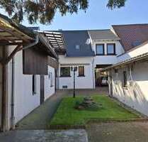 Haus zum Kaufen in Oberhausen-Rheinhausen 410.000,00 € 150 m²