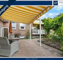 Flachdach-Einfamilienhaus (Split-Level) mit vermieteter Gewerbeeinheit in Schortens-Grafschaft - Schortens / Grafschaft