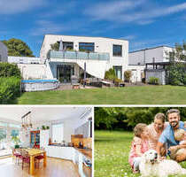 PHI AACHEN - Charmantes Zweifamilienhaus mit zwei Garagen und Garten in begehrter Lage von Würselen!