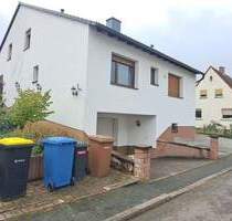 Großzügige Erdgeschoss- und Untergeschosswohnung mit Garten, Pool & Garage in Oberrodenbach