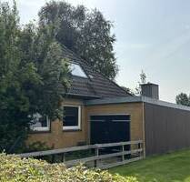Ihr Eigenheim in Marnerdeich: Charmantes Einfamilienhaus mit großem Grundstück und vielseitigen Nutzungsmöglichkeiten