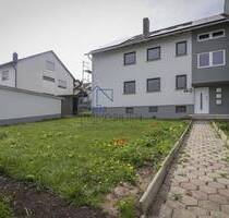 Charmante 4-Zimmerwohnung im ersten Obergeschoss mit Balkon und Gartenanteil - Hambach
