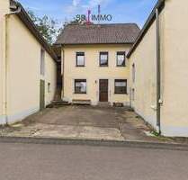 Ehemaliges Bauernhaus mit Nebengebäuden in Kruchten