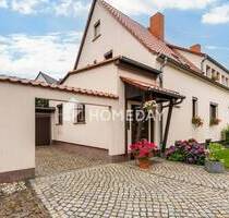 Idyllische Wohnqualität mit Garage, Garten, überdachter Südterrasse, Nebengebäude & Raumvielfalt - Wurzen OT Burkartshain