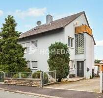 Vielseitiges Einfamilienhaus mit zwei Wohneinheiten, Garagen und Nebengebäude in ruhiger Lage - Waldbrunn