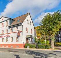 Traditionsreiches Wohn- und Geschäftshaus mit Gaststätte und Entwicklungspotenzial - Hofheim Lorsbach