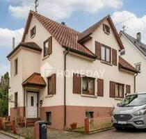Vielseitiges Zweifamilienhaus in Winnenden: EBK, Kamine, Wintergarten, Terrasse und Garten inklusive