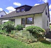 Idylle trifft Wohnkomfort - Einzigartiges Haus am Weiher mit Blick ins Grüne in Eckental. Preis gem. Gutachten!