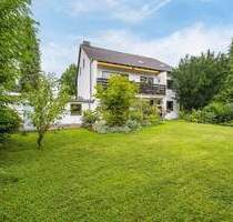 AIGNER - Vielseitig nutzbares Mehrparteienhaus mit großzügigem Grundstück in Gröbenzell!