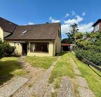 Doppelhaushälfte mit Anbau, Garage und Nebengebäude auf großzügigem Grundstück Kiel-Kronsburg