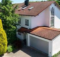 Gepflegtes Reiheneckhaus mit Garten, Ausbaupotenzial und großer Doppelgarage - Burghausen