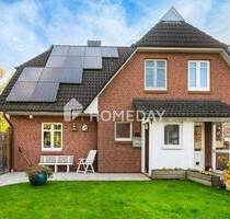 Praktische und gepflegte DHH mit Südterrasse, Kamin und Carport | Schöne Lage in Elbe-Nähe - Jork