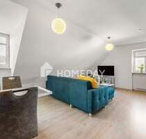 Sofort bezugsfrei: Gepflegte Dachgeschosswohnung mit Aufzug, Tiefgaragenstellplatz in zentraler Lage - Meißen