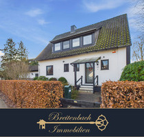 Lilienthal-Butendiek . Gepflegtes Einfamilienhaus mit schönem Garten in ruhiger Lage