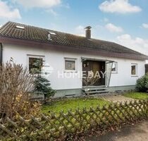 Attraktives Einfamilienhaus mit Einliegerwohnung, schönem Garten und viel Platz für die Familie - Jungingen