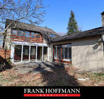 Baugrundstück mit Bestandsgebäude in attraktiver Lage von Henstedt-Ulzburg (Rhen)