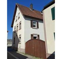 Vermietetes Zweifamilienhaus mit Garten im Altort Thüngersheim