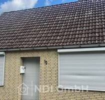 Einfamilienhaus mit großem Grundstück, Garagen und Entwicklungspotenzial in Uetersen