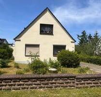 Freistehendes Einfamilienhaus mit Einliegerwohnung und Garage in 23626 Ratekau