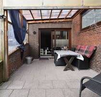 Trittau - Gut vermietete 2-Zimmer Eigentumswohnung im Souterrain mit Terrasse und Garten