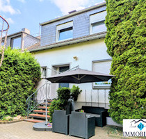 Eckreihenhaus mit Garten und Garage in Kalkar
