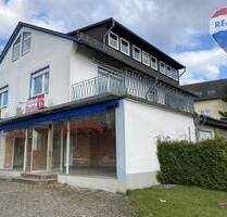 Mehrfamilienhaus mit Ladengeschäft und Halle - Holzappel