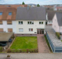 Vermietetes Zweifamilienhaus mit Bauplatz in zweiter Reihe - Vielseitiges Entwicklungspotenzial - Stutensee / Blankenloch