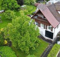 Charmantes Einfamilienhaus mit Wintergarten und idyllischem Gartenparadies - Scheer