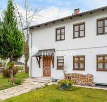Gemütliches Reihenendhaus mit großem Garten und Potenzial für ein weiteres Wohngebäude. - Geretsried