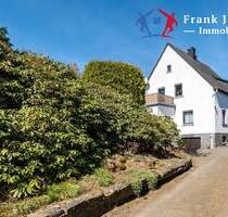 Neuer Preis! Freistehendes Einfamilienhaus in Daun - ebenerdiges Wohnen - toller Garten - Garage