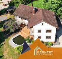 Einfamilienhaus mit Einliegerwohnung, Garten und Schwimmteich, in Parknähe am Rande von Coburg - Sonnefeld