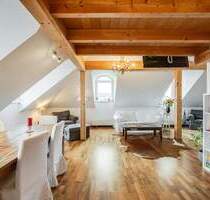 AIGNER - Über den Dächern Münchens: Außergewöhnliche DG-Wohnung mit Galerie