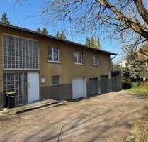 Großzügiges Einfamilienhaus mit schönem Garten und 4 Garagen, Eppelborn