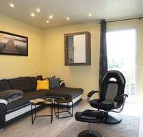 AUMÜLLER-Immobilien - Gemütliche Doppelhaushälfte mit drei Garagen und zwei Terrassen - Birstein