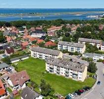 VERKAUFTHeiligenhafen, charmante 3 Zi.-65m² ,Hochparterre-Wohnung mit Balkon, EBK u. Vollbad in ruhiger Lage
