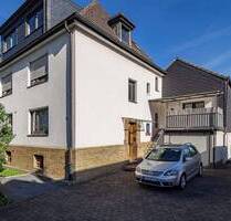 Attraktives Mehrfamilienhaus mit Garage, Lager, Apartment und angebautem Einfamilienhaus in Neheim! - Arnsberg / Neheim Neheim-Hüsten