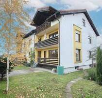 Gepflegte 3-Zi. Hochparterre Wohnung mit eigenem Garten, Einzelgarage und Außenstellplatz - Bruckmühl Heufeld