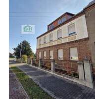 Charmante Doppelhaushälfte mit drei Wohneinheiten, Keller & großem Grundstück – ideal für Familien - Raguhn-Jeßnitz