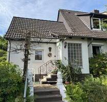Idyllisch gelegene Doppelhaushälfte mit Wintergarten in Kassel 