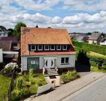 Vielseitiges Einfamilienhaus mit Betriebseinheit, Ausbaupotenzial und großem Garten - Löhne