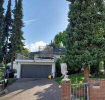 Freistehender Bungalow in Freisen OT, mit Wintergarten, Gartenterrasse, Garten und Doppelgarage (zusätzliche Tor-Zufahrt Rückseite) - Sankt Ingbert Oberwürzbach