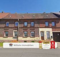 Reihenmittelhaus mit Nebengelassen und schönem Grundstück in guter Lage zum individuellen Ausbau - Krostitz