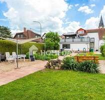 Exklusives Wohnen: Ihr neues Zuhause mit beeindruckender Dachterrasse und Gartenparadies - Schwalbach