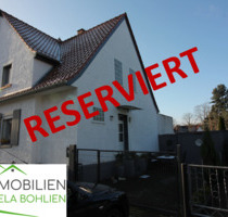 Doppelhaushälfte mit Garten und Garage in der Kamp-Lintforter Altsiedlung