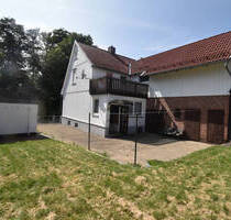 Freistehendes Einfamilienhaus mit kleinem Nebengelass, Garage und ebenerdigen Grundstück - Walkenried