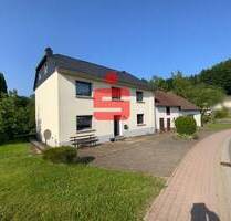 Einfamilienhaus mit Nebengebäuden auf großem Grundstück - Sellerich