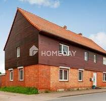 Charmantes Mehrfamilienhaus mit zwei Wohneinheiten, Garage, Carport und großzügigem Garten - Lehre Essehof