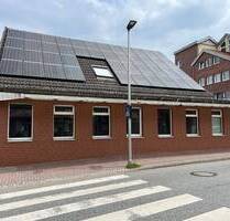 Teilweise vermietetes Geschäftshaus mit einer Wohnung im Obergeschoss - Tostedt