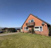 Einfamilienhaus mit Produktions- und Lagerfläche sowie Garage in attraktiver Lage - Stedesand